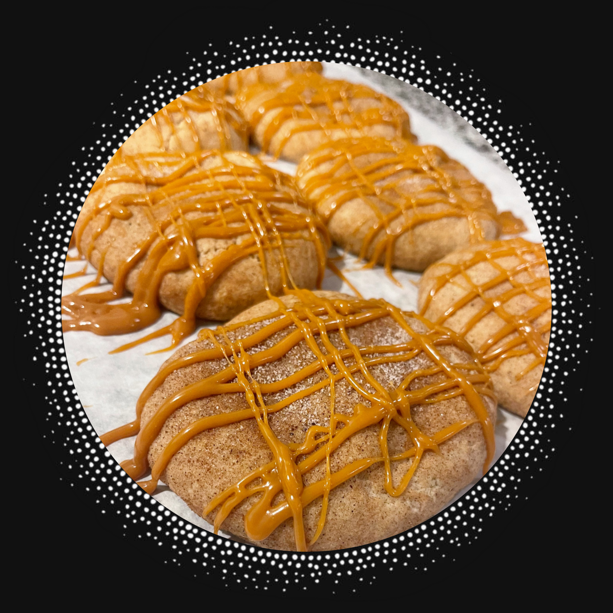 pumpkin cookie rolled in pumpkin spice sugar and drizzled with dulce de leche